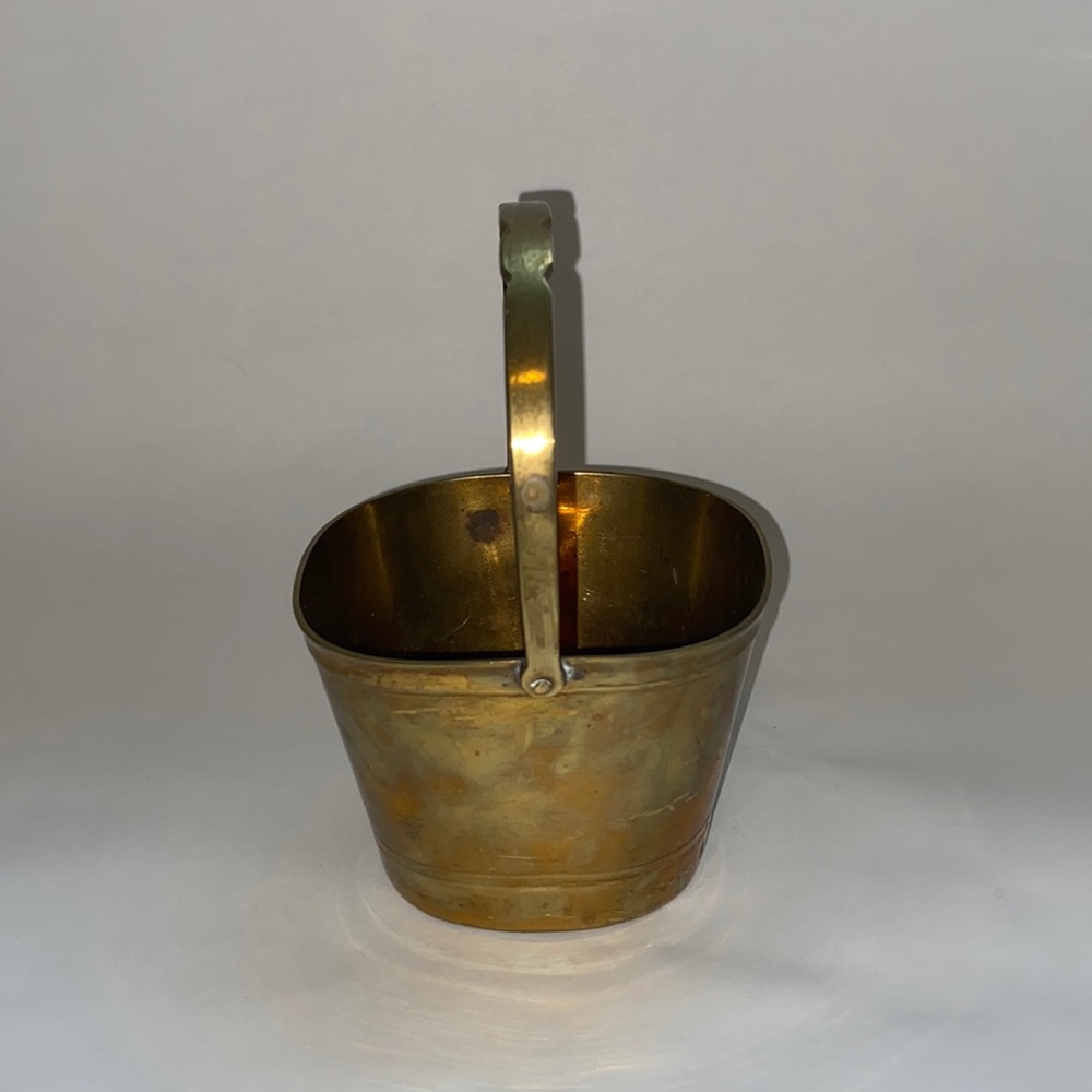 Vintage brass basket with moveable handle